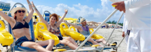 people doing accessible tourism on the beach
